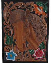 hand carved portrait of a horse surrounder by vinework and flowers