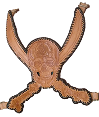 hand carved image of a skull and two crossed swords